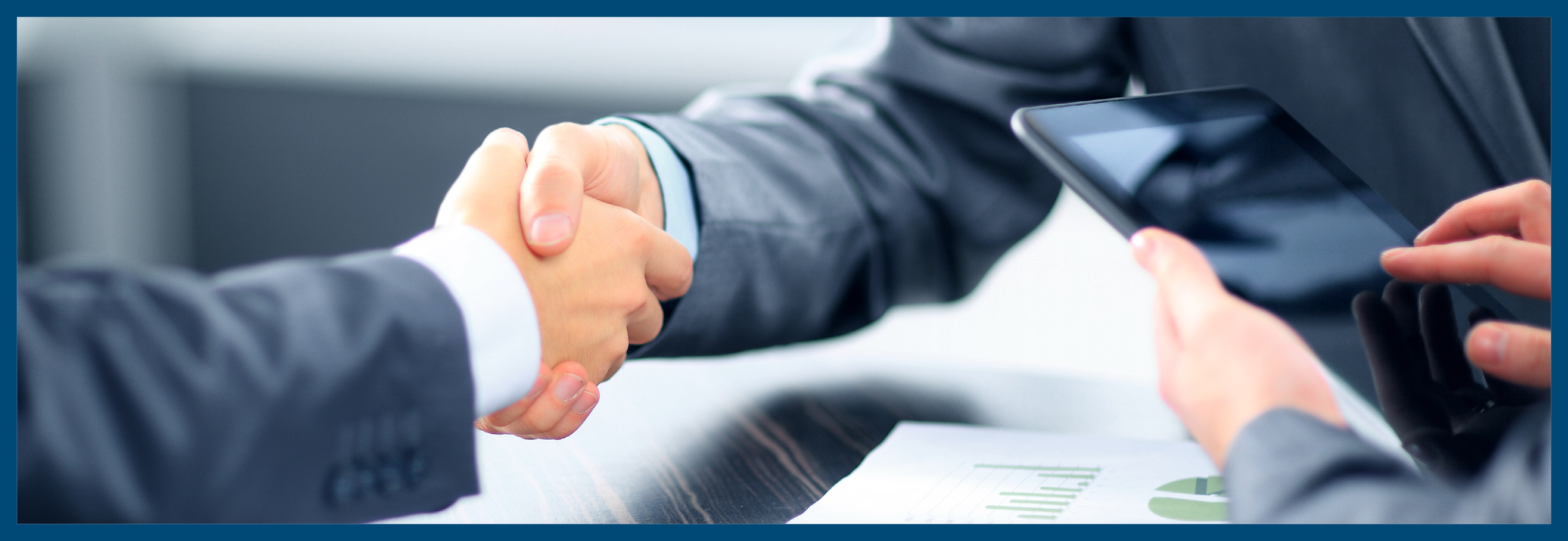 Business people shaking hands in office