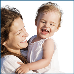 Portrait of mother and little daughter on the beach